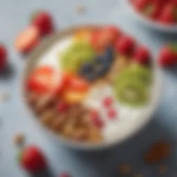 A bowl filled with creamy yogurt topped with fresh fruits and nuts
