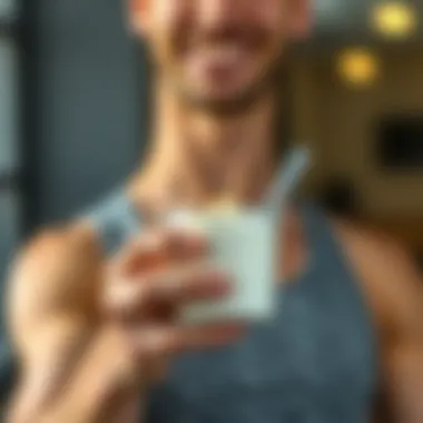 A fitness enthusiast holding a cup of protein yogurt