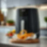 Philips Air Fryer Beyaz in a Stylish Setting Sleek Philips Air Fryer in a modern kitchen